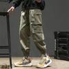 Черная мужская одежда больших размеров, спортивные штаны для бега, хлопковые брюки-карго Homme, японская техническая одежда для бега в стиле хип-хоп 5XL, брюки для мужчин