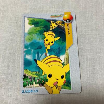 Использованная в то время карточка Pokemon Carddass Пикачу