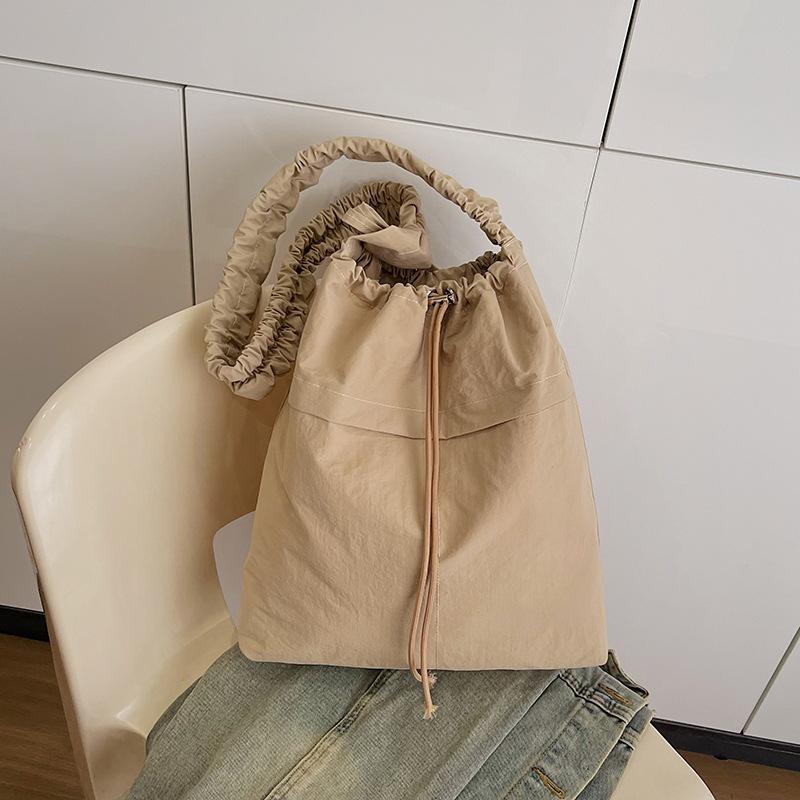 Fashion Drawstring Shoulder Women's Bag 2025 New Nylon Messenger Bag Korean Version Niche Casual Art Canvas Bucket Bag