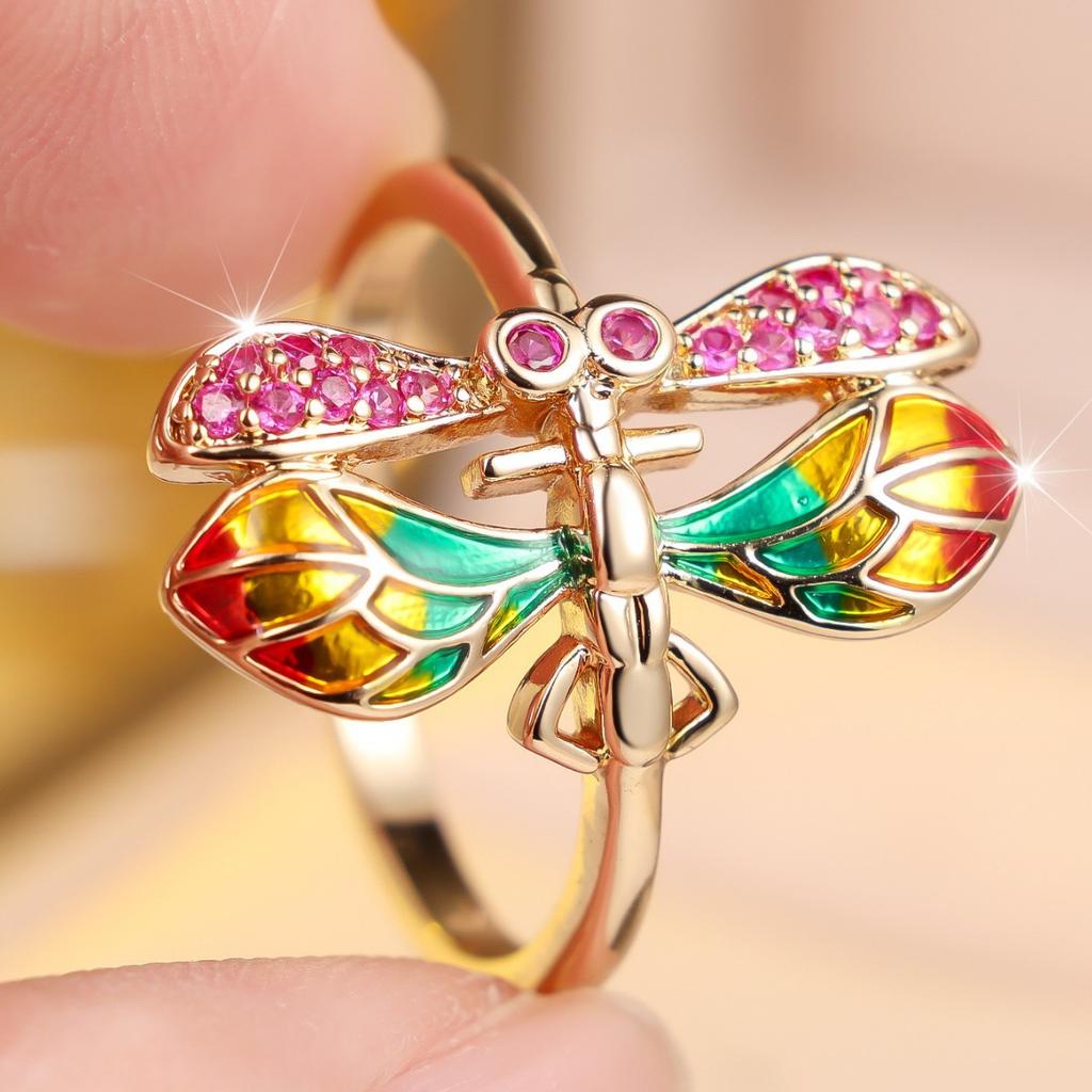Vintage-style ring featuring a dragonfly design with enamel and glaze detailing Light luxury, diamond-studded, dynamic, and unique accessories that
