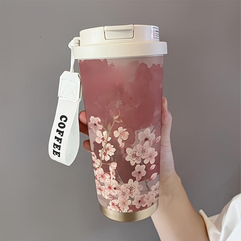 17.92oz cherry blossom insulated cup, leak-proof with straw, portable for hot and cold drinks.