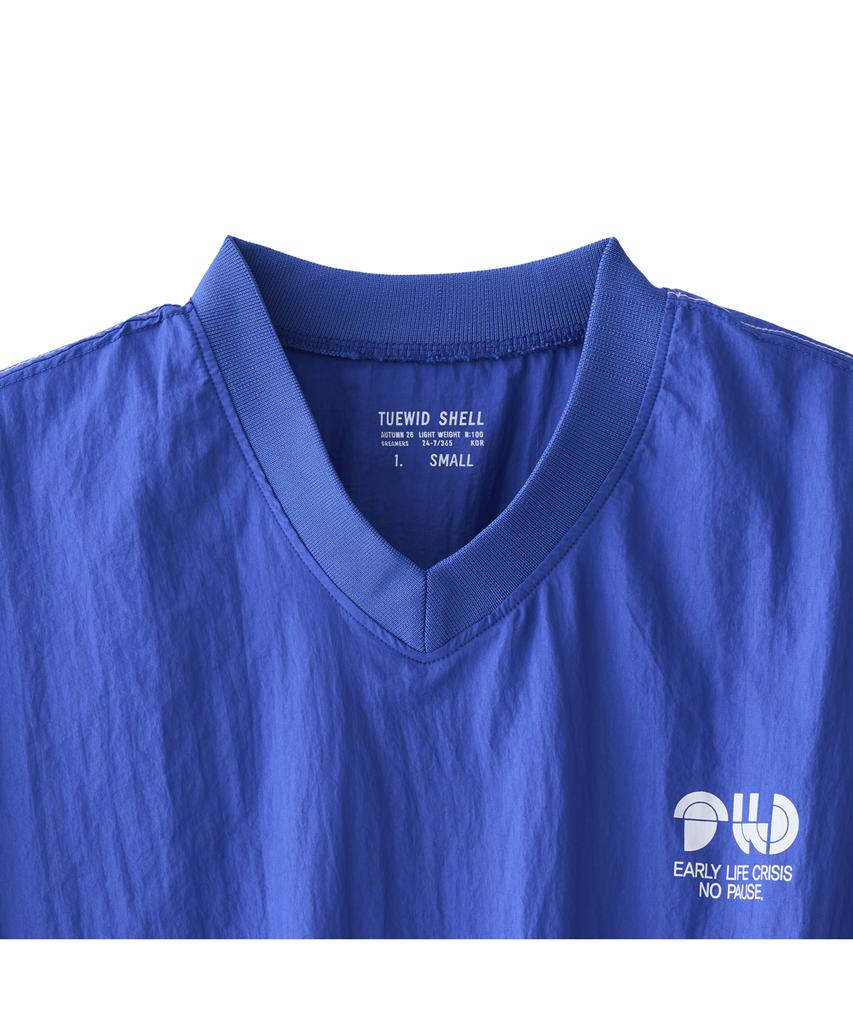 TUEWID V-Neck Wind Shell Pullover In Varsity Blue