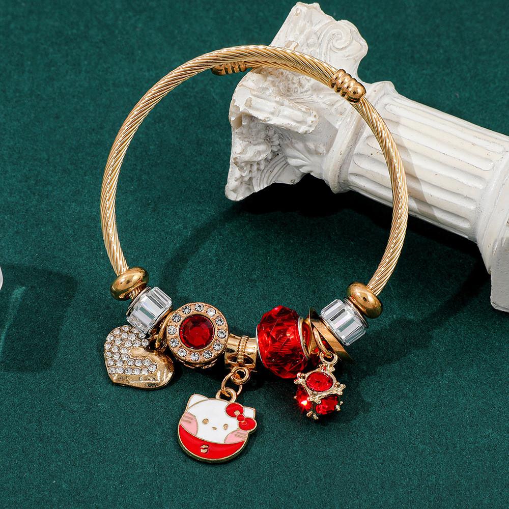 Браслет Hello Kitty с подвеской в виде сердца с жемчугом. Для подарка и сувениров из поездок.