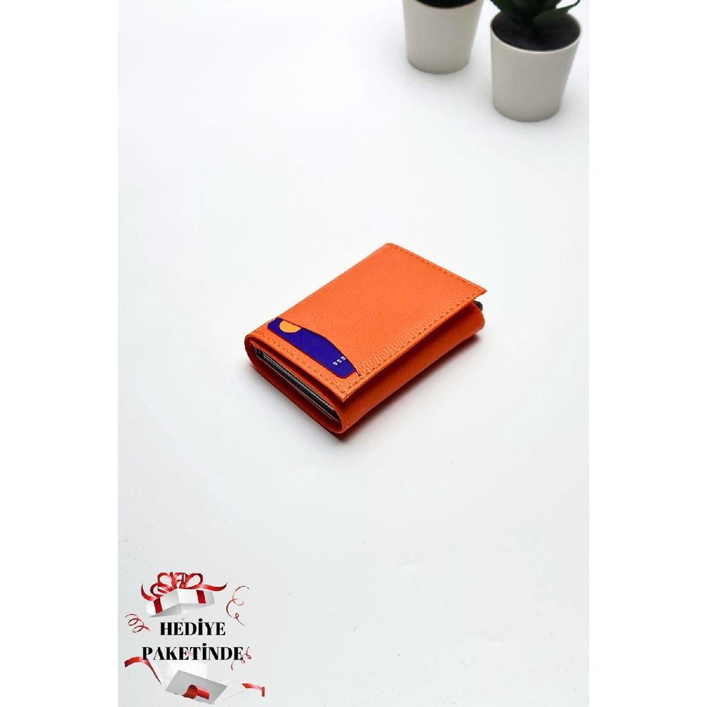 Оранжевый кошелек из веганской кожи унисекс с отделением для денег и держателем для карт с автоматическим механизмом. Подарочный пакет для портфолио?