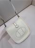 Evelyn Cowhide Crossbody Bag with Hollowed-Out Design – Fashionable, Versatile Single Shoulder Bag for Commuting