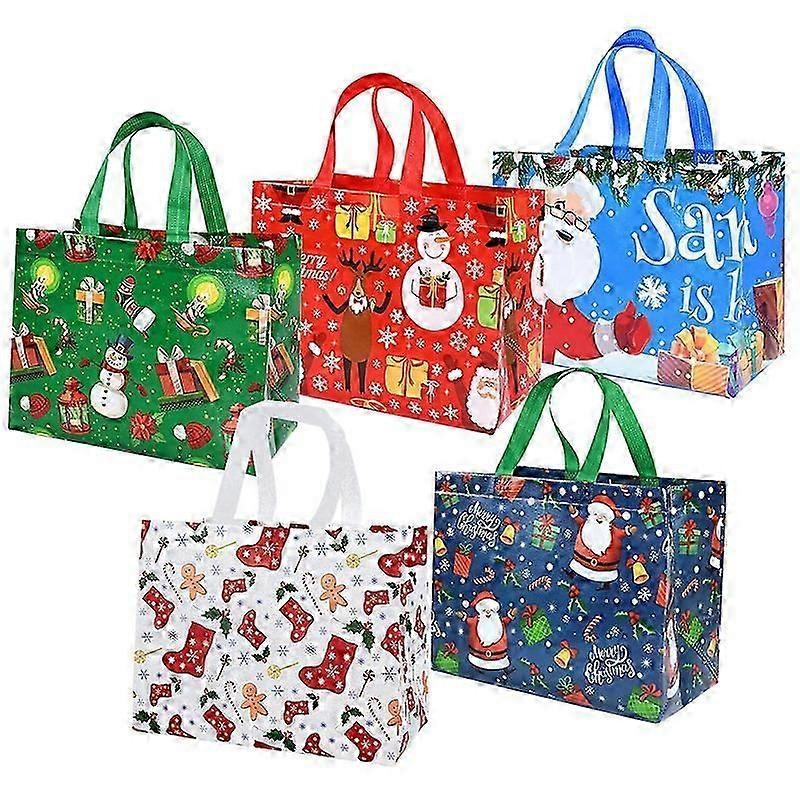 Christmas gift bag with a Santa Claus, snowman, and candy design. Ideal for Christmas parties and home decor. New Year 2025.