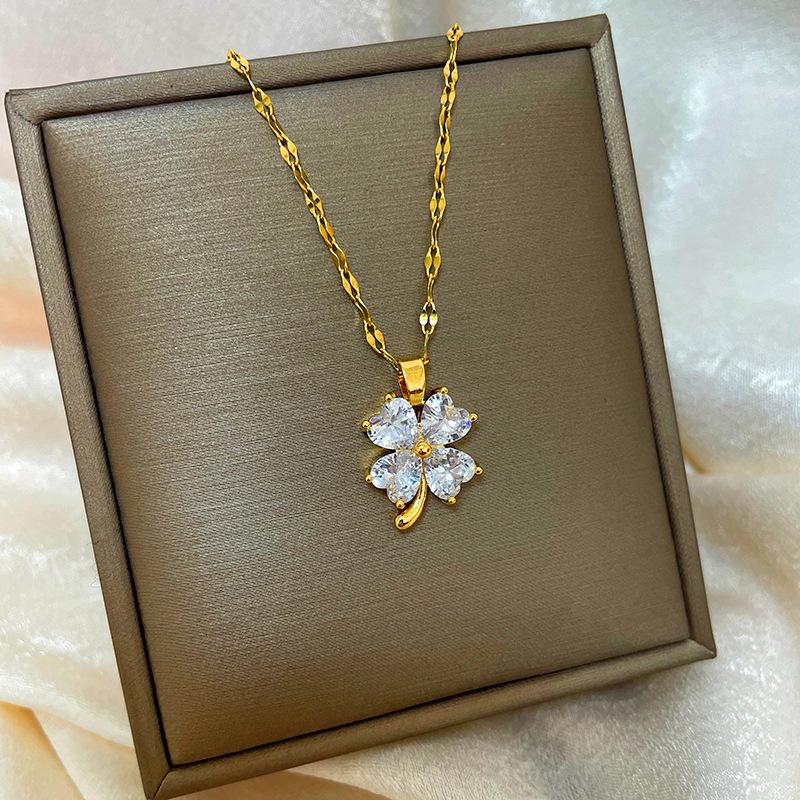 Позолоченная медь 18 карат, цепочка на ключицу с дизайном абака, тыквы-горлянки и лебедя.