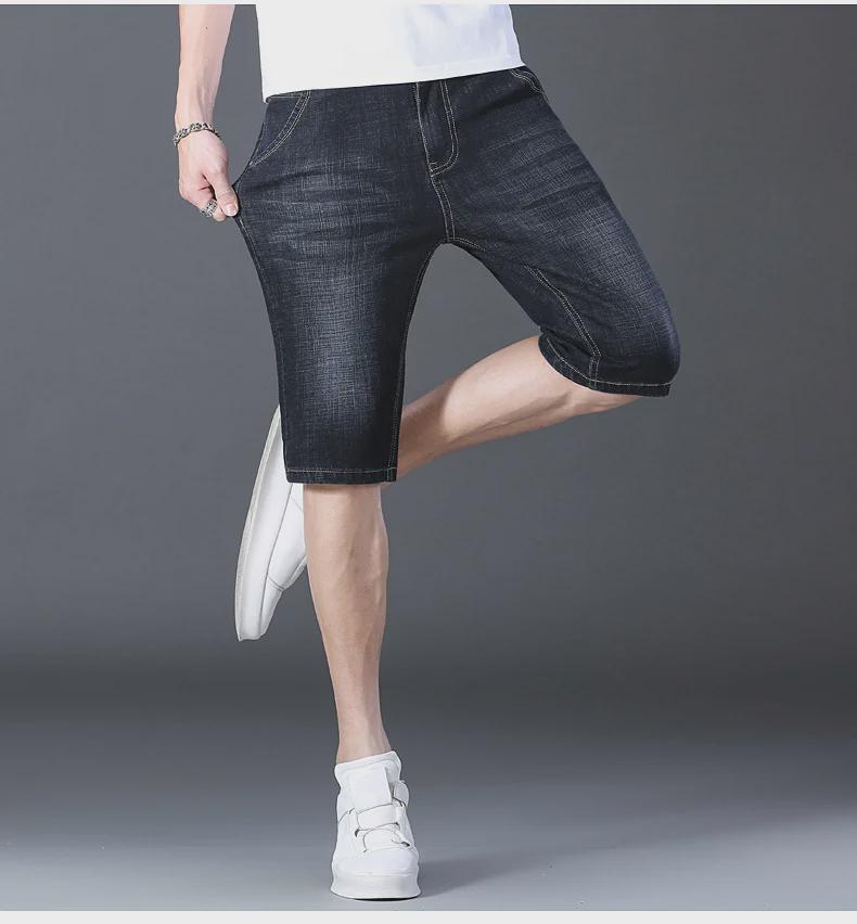 Popular Men's Cropped Four-Season Trousers: Elastic, Mid-Waist, and Trendy 7-Point Regular Denim for Youthful Style