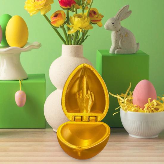 3D-печатная игрушка в виде яйца со средним пальцем. Цветное пасхальное яйцо со средним пальцем.