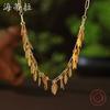 Новое золотое ожерелье с бахромой из маленьких листьев, женское ретро-универсальное высококлассное ожерелье с листьями