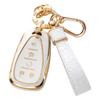 Подвеска в виде чехла для ключей от машины с золотым краем и узором из камня - хит продаж.