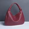 2025 European & American Handwoven Women's Crescent Shoulder Bag - Large Capacity Dumpling Design