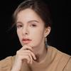 Серьги с зеленым хвостом