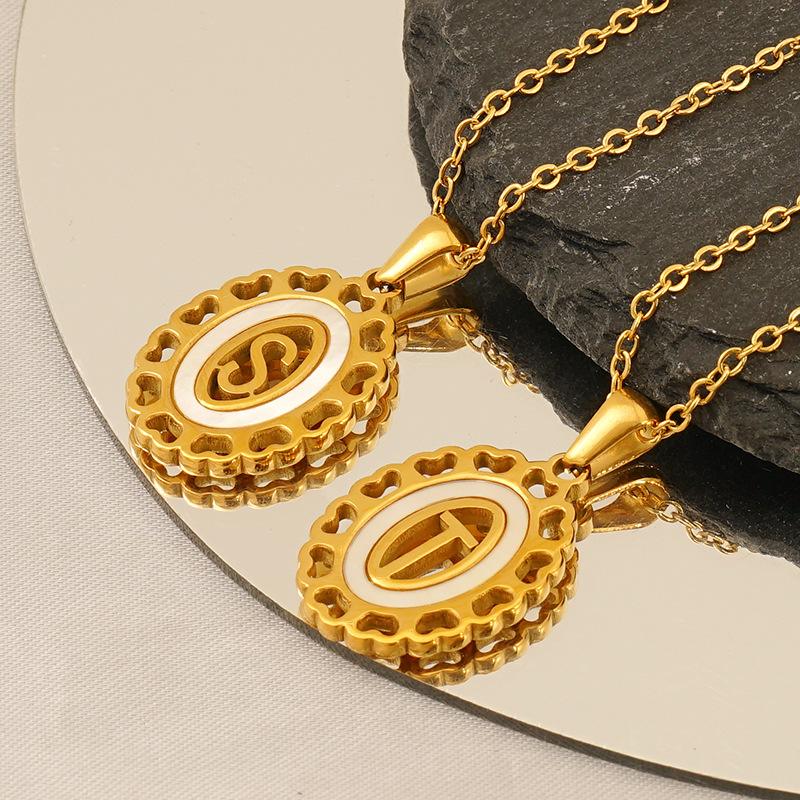 Titanium steel love hollow letter pendant female versatile fashion simple oval letter necklace female