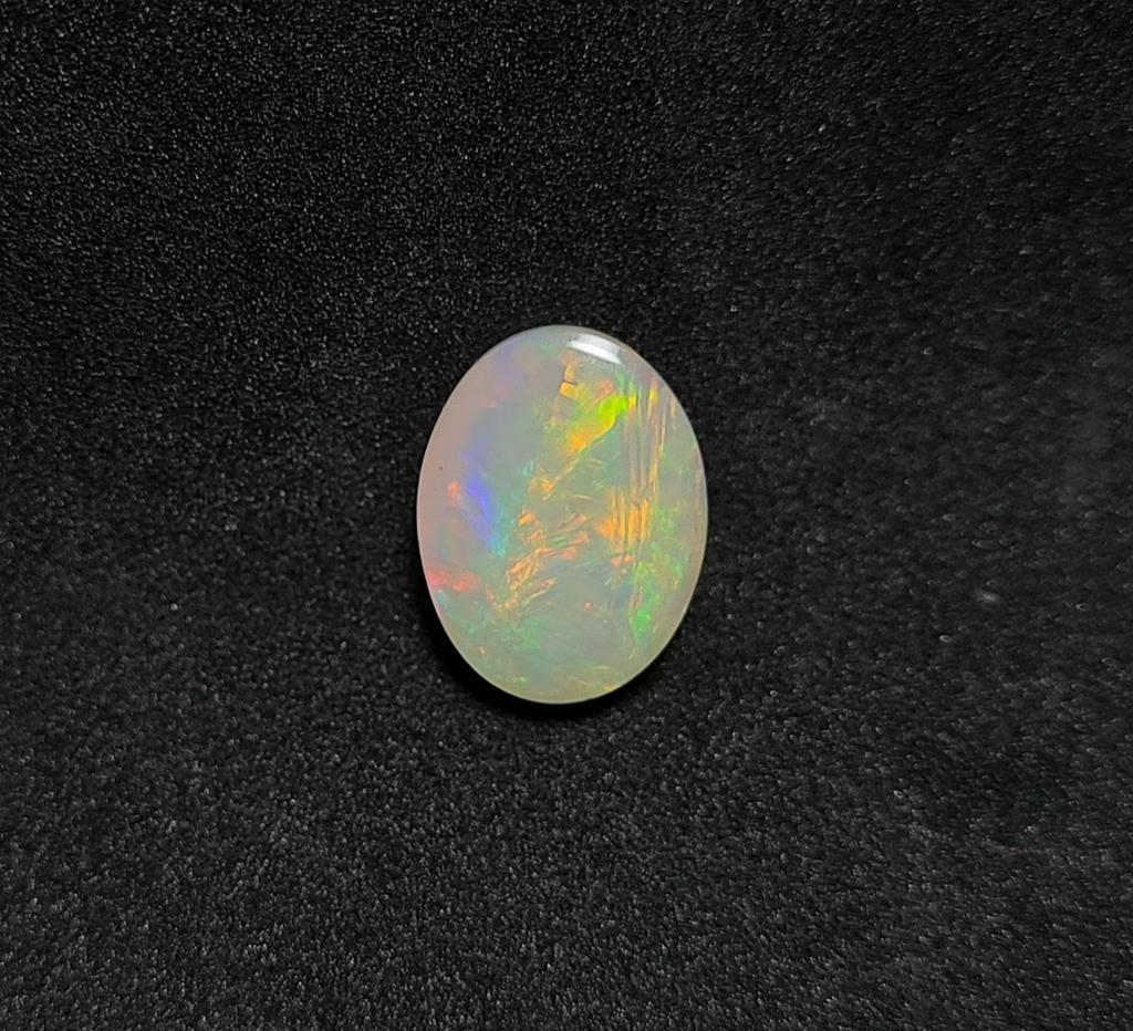 Естественная свободная драгоценная камень кабошон эфиопского опала размер 4,55 карата 14кс11кс6 ММ