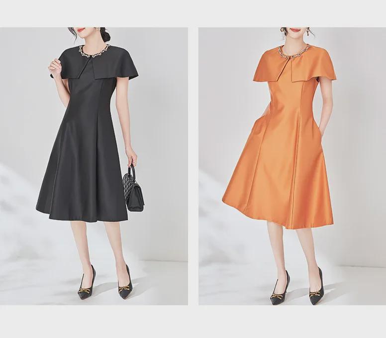 Высококачественное платье-накидка без рукавов с отделкой в виде бриллиантовых гвоздей