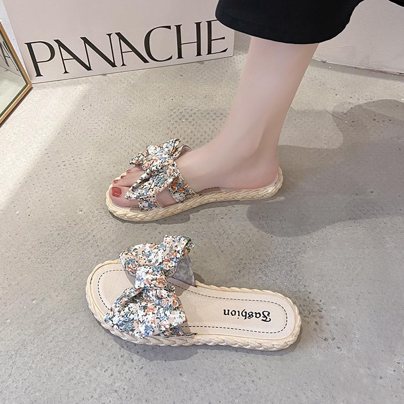 Новые женские тапочки, сандалии и тапочки Цветочные банты Универсальная верхняя одежда Пляжные шлепанцы с плоской подошвой Модные универсальные шлепанцы