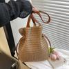 Нишевая модная соломенная сумка на плечо с ремешком, женская весенняя новинка, простая вместительная пляжная сумка-тоут, тренд