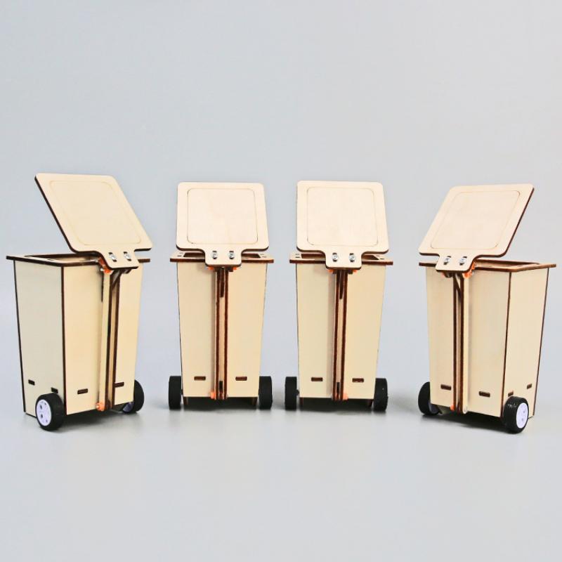 Технология Малое производство Переворачивающийся мусорный бак Ученики начальной и средней школы Научный эксперимент Головоломка Творческое изобретение Ручная работа Материал для поделок