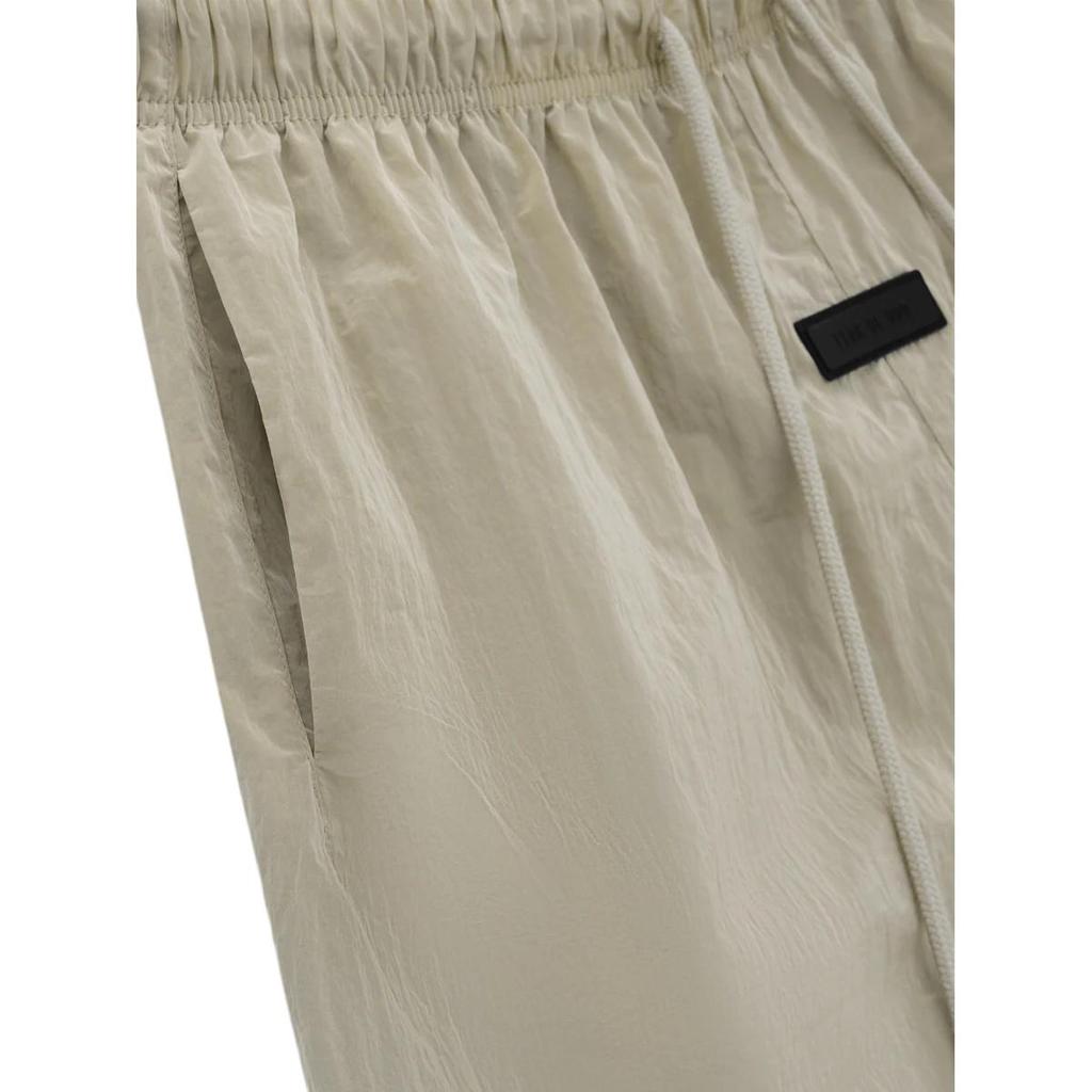 Fear of God Нейлоновые шорты для бега Essentials Желтые мужские шорты для бега Garden 160SP244131F