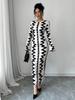 Европейское и американское облегающее платье с черно-белым принтом на осень/зиму 2025 года с круглым вырезом и длинными рукавами