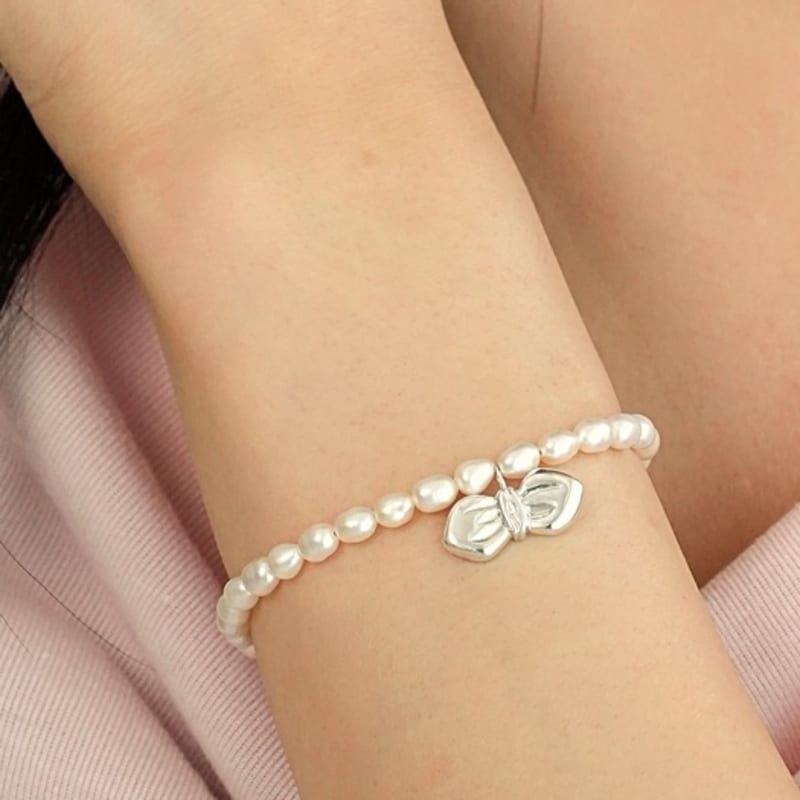 BELLOOGGI Bold ribbon pearl bracelet