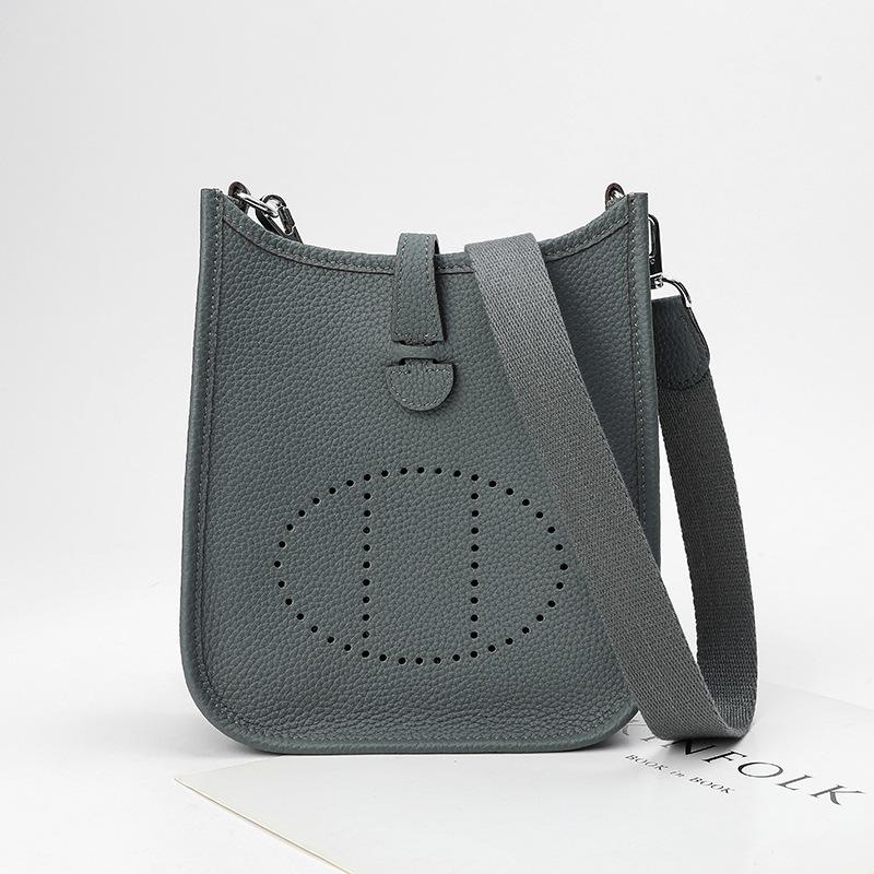 Фабричная оптовая продажа сумка-ведро из натуральной коровьей кожи первого слоя женская сумка с узором личи полый дизайн на одно плечо через плечо полый дизайн