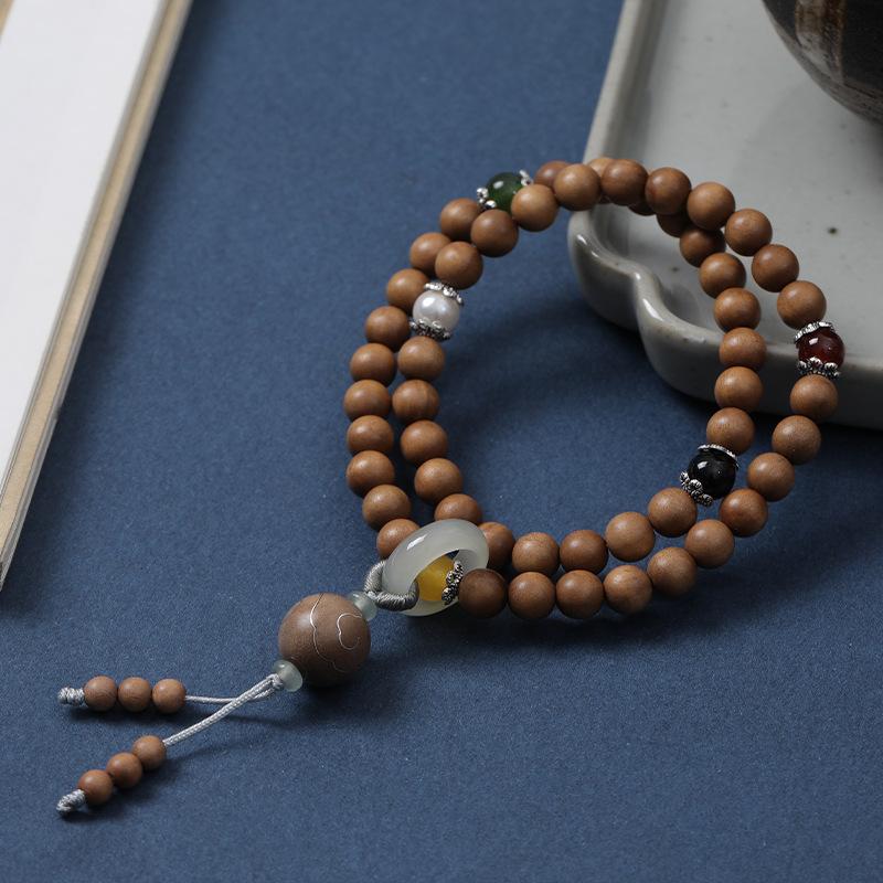 Gold-swallowing beast, old mountain sandalwood inlaid with silver auspicious cloud bracelet, natural jade female rabbit year natal year bracelet