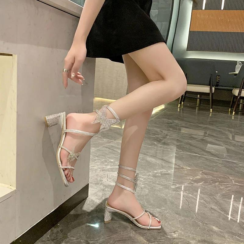 Модные женские сандалии на высоком каблуке Fairy, новинка 2024 года, летние сексуальные блестящие сандалии со стразами и змеей, тапочки, женская классная обувь