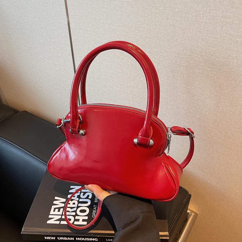 Премиальная нишевая сумка с чувством, женская весна-лето 2025, новая модная простая сумка-мессенджер, женская портативная сумка-боулинг