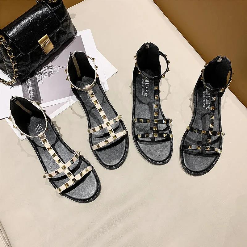 Сандалии женские корейские летние туфли с заклепками модные универсальные римские туфли на плоской подошве сандалии тапочки