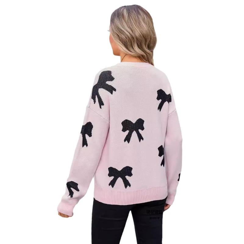 Женский вязаный свитер с бантом и длинными рукавами