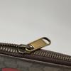 [Pre-Owned] Monogram Logo Letter Print Striped Wristband Canvas And Leather Clutch - Very Good #DBV4NS