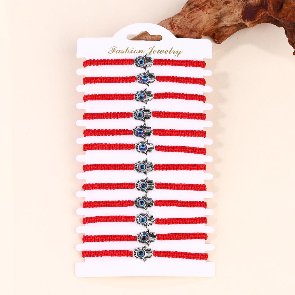 Набор браслетов из красной нити с синим сглазом - Ручная работа, плетеный дизайн