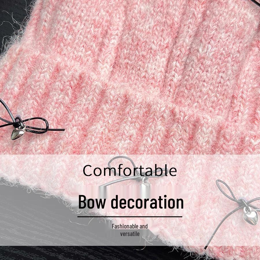 Вязаная шапка с кошачьими ушками на осень/зиму 2025 - Теплая и универсальная, с дизайном в виде банта, который подчеркивает лицо