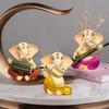 Sitting Ganesha with Musicall Instrumnents Decorative Statue for Home Decor - (Set of 3 Piece, Multicolor)