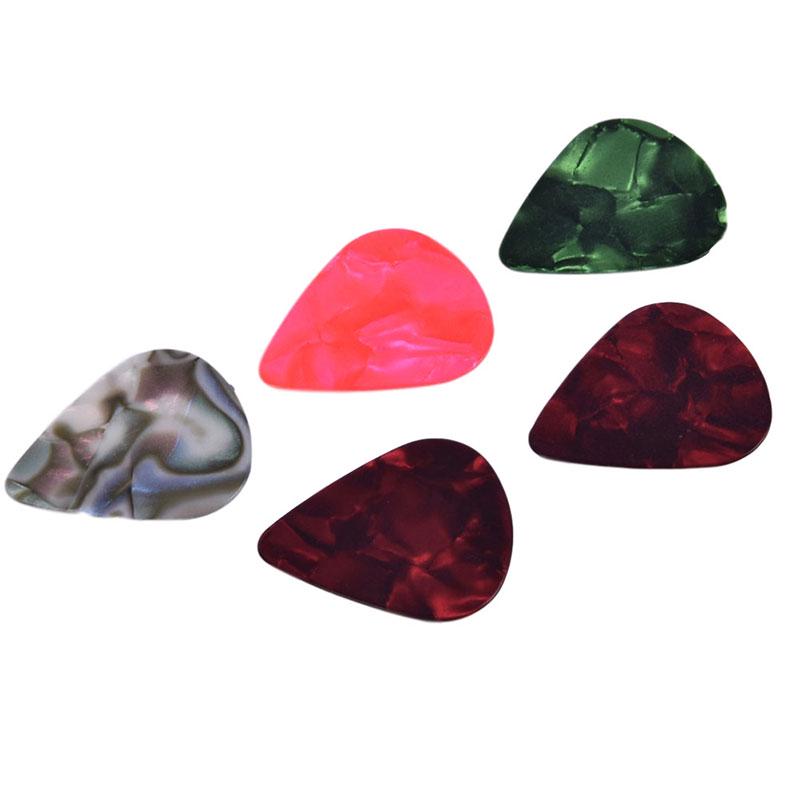 1 гитарный каподастр и 5 медиаторов для акустической электрогитары. Аксессуары