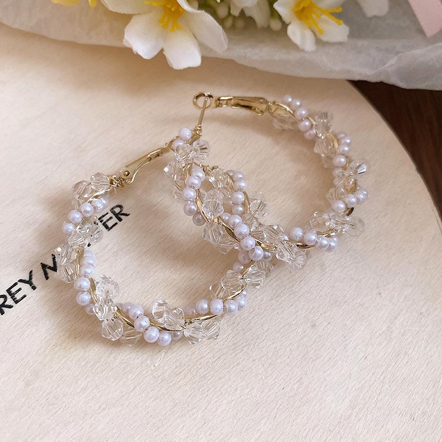 Silver needle pearl beaded twisted round earrings simple fashion earrings light luxury high sense earrings design sense niche