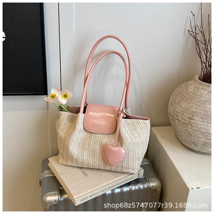 Straw bag women's 2025 new seaside woven handbag niche crossbody bag versatile tote bag is popular this year