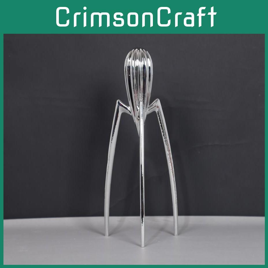 Соковыжималка Juicy Press Salif с зеркально полированным дизайном для ежедневного бытового использования