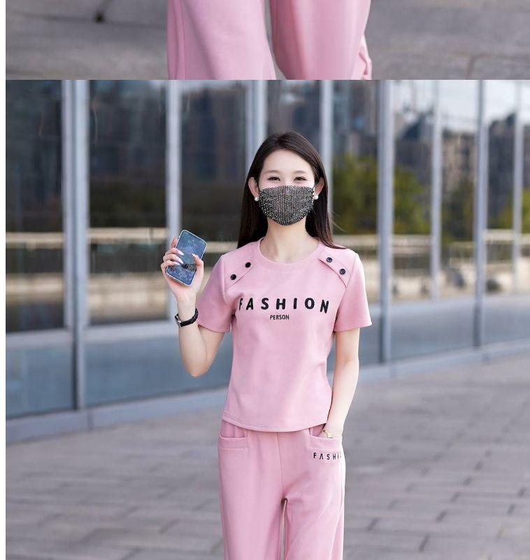 Молодежный летний 2025 комплект: свободный топ с круглым вырезом и короткими рукавами и брюки прямого кроя - модная спортивная одежда для универсального стиля, уменьшающего возраст