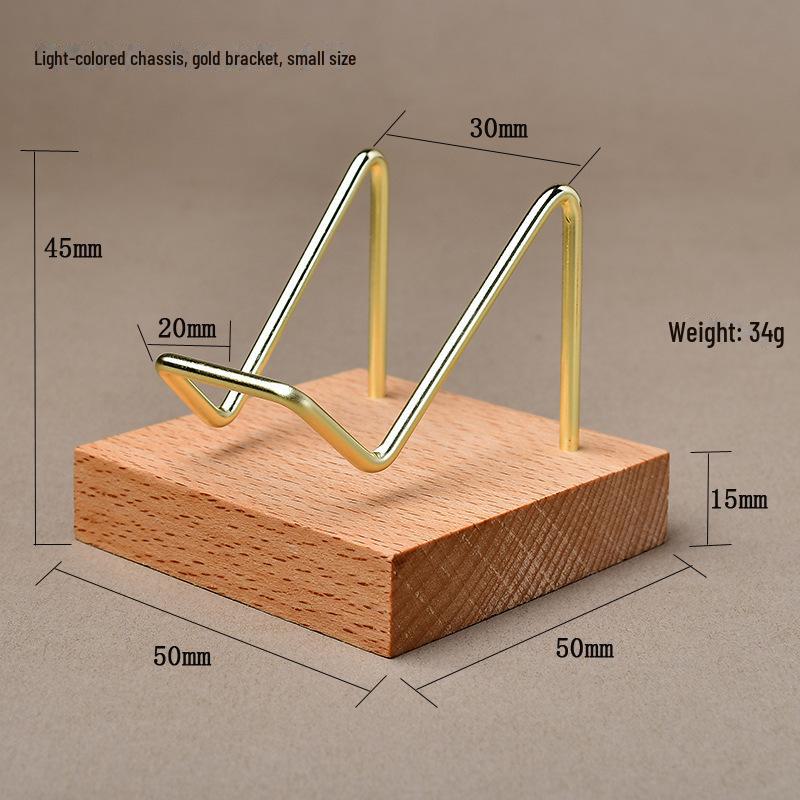 "Heart-Shaped Crystal Mineral Specimen On Iron Stand with Wooden Jewelry Display"