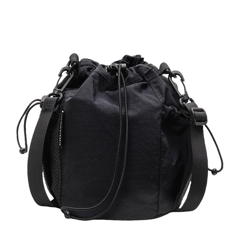 2025 New Japanese Leisure Niche Outdoor Sports Drawstring Bucket Bag Fashionable Versatile Light Travel Messenger Bag