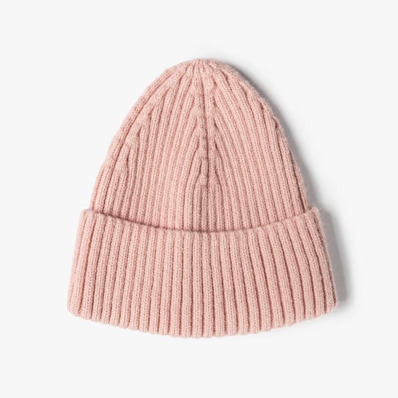 Fashion jacquard knitted hat women's autumn and winter outdoor warmth brimless pointed hat thickened ear protector wool hat tapered hat