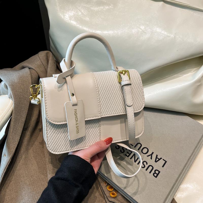 2025 new contrasting color retro portable small square bag female Sen Meng fashionable texture shoulder bag personalized commuter messenger bag
