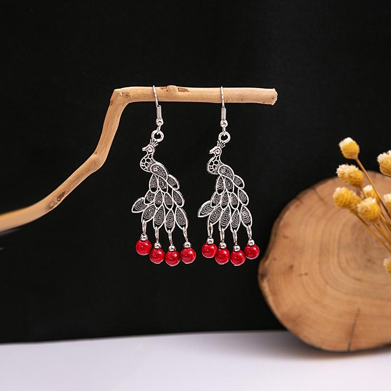 European and American Retro Hollow Turquoise Tassel Bohemian Earrings for Women