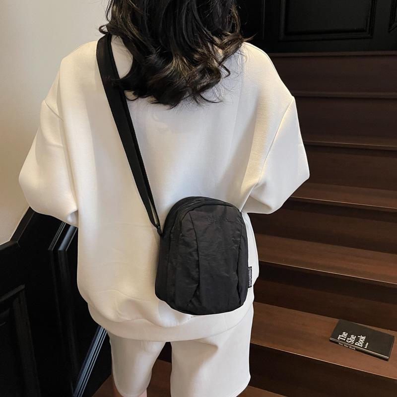 Versatile small bag Crossbody bag Women's casual canvas bag Light commuter cloth bag Men's mobile phone bag