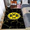 Современный черно-желтый ковер с логотипом футбольного клуба BVB 09. Подходит для использования в качестве противоскользящего покрытия для гостиной, спальни, диванов.