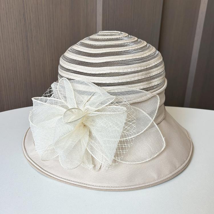 Eugen yarn flower pot hat outdoor casual fashion sunshade sunscreen hat summer new women's big edge breathable cool hat