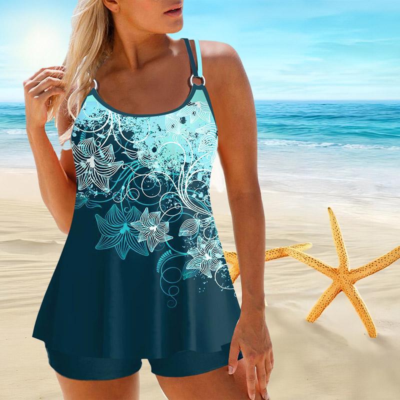 Женский купальник с бретелями и маленьким бикини с ромашками и короткой майкой.